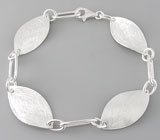 Комплект "Лепестки" из текстурного серебра Серебро 925