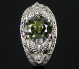 Кольцо с зеленым сапфиром и бесцветными топазами Серебро 925