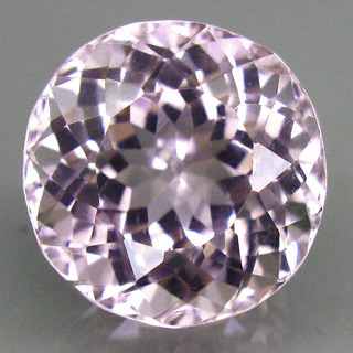Серебристо-розовый кунцит 6,6 карат