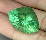 Ярко-зеленый флюорит лазерной огранки 42,67 карат 