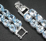 Роскошный браслет с голубыми топазами Серебро 925