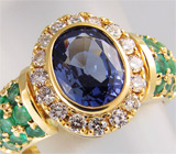 Кольцо с чистейшим танзанитом, изумрудами и бриллиантами Золото