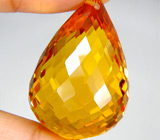 Крупный золотистый цитрин-бриолет 76,1 карат 