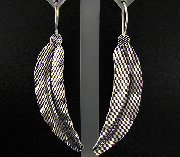 Крупные серьги из текстурного серебра