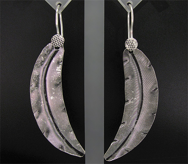Крупные серьги из текстурного серебра