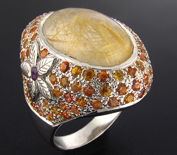 Кольцо с рутиловым кварцем, золотистыми сапфирами и аметистом