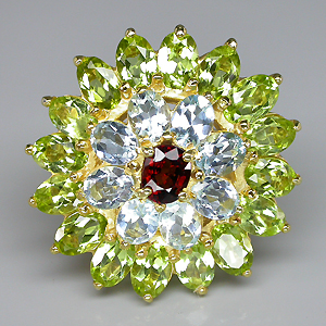 Крупное кольцо из коллекции "Mia" с гранатом, топазами и перидотами