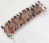 Широкий браслет с рутиловым кварцем, родолитами гранатами и пузырчатым кварцем Серебро 925