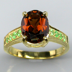 Кольцо из коллекции "Mia" с империал топазом и цаворитами