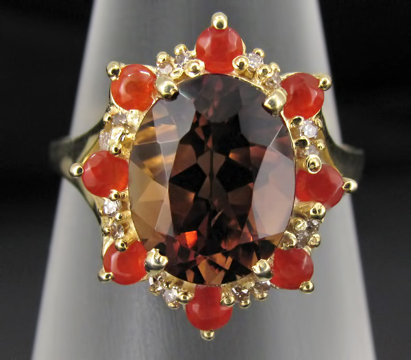 Кольцо из коллекции "Mia" с империал топазом и корнелианами