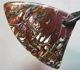 Болдер опал 46,85 карат на шнуре 