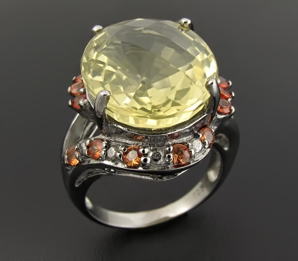 Кольцо с цитрином эффектной огранки и разноцветными сапфирами