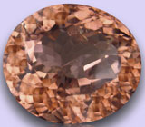 Кольцо с крупным насыщенным морганитом, 12-ю бриллиантами и 11-ю танзанитами Золото
