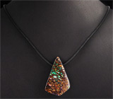 Австралийский болдер опал 51,71 карат на шнуре 