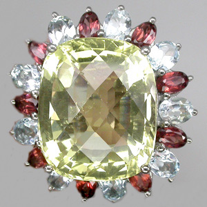 Крупное кольцо с цитрином, гранатами и топазами