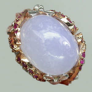 Кольцо с крупным кабошоном халцедона, топазами и сапфирами