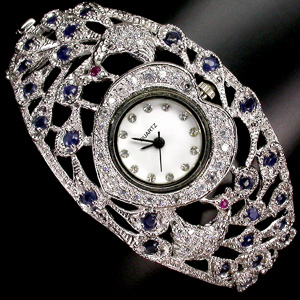 Филигранные часы-браслет с сапфирами