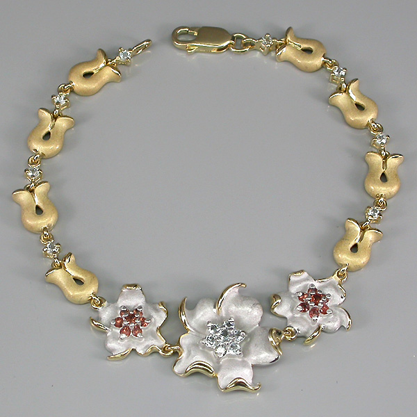 Изысканный браслет с гранатами и топазами