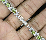 Часы на браслете из перидотов Серебро 925