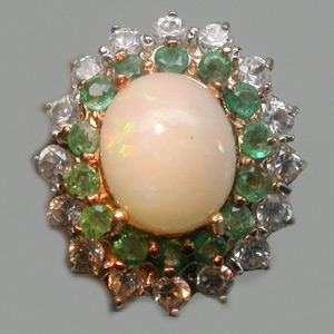 Кольцо с белым solid опалом, изумрудами и цирконами