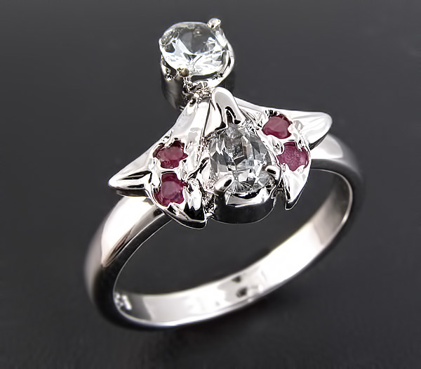 Изящное кольцо с топазами и пурпурными сапфирами