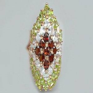 Крупное кольцо с гранатами, топазами и перидотами