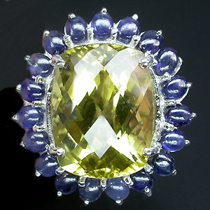 Замечательное кольцо с цитрином в окружении кабошонов синих сапфиров