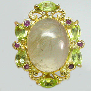 Кольцо с рутиловым кварцем, перидотами и сапфирами