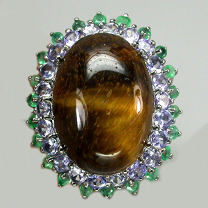 Кольцо с тигровым глазом, танзанитами и изумрудами