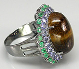 Кольцо с тигровым глазом, танзанитами и изумрудами Серебро 925