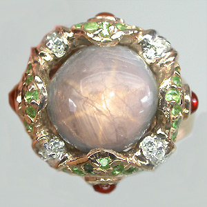 Кольцо из коллекции "Mia" со звездчатым сапфиром, корнелианами и цаворитами