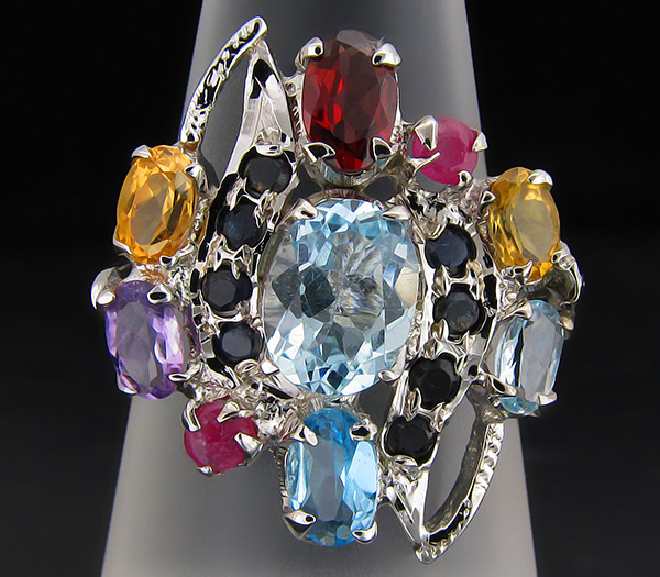 Кольцо с топазами, цитринами, гранатом, аметистом и сапфирами