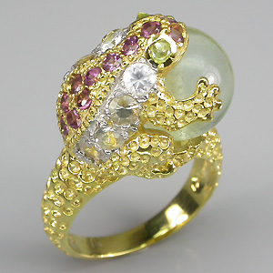 Оригинальное кольцо с флюоритом, родолитами, перидотами и цирконами