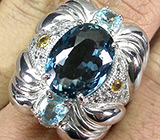 Массивное кольцо с синим топазом, голубыми цирконами и желтыми сапфирами Серебро 925