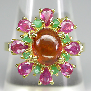 Кольцо со спессартином гранатом, изумрудами и розовыми сапфирами