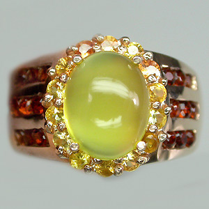 Кольцо из коллекции "Mia" с опалом, золотистыми сапфирами и гранатами