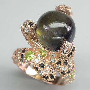 Оригинальное высокое кольцо с иолитом, перидотами, топазами и сапфирами