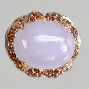 Крупное кольцо с халцедоном и гранатами