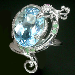 Прелестное кольцо с топазом, изумрудами, иолитами и сапфирами