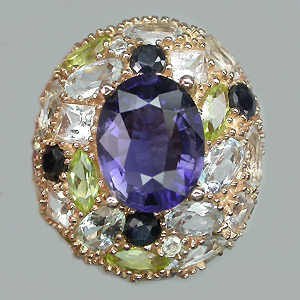 Кольцо с иолитом, топазами, перидотами, цирконами и сапфирами