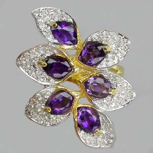 Оригинальное кольцо с аметистами и бесцветными сапфирами