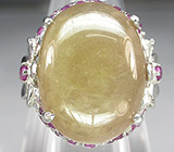 Кольцо с крупным кабошоном сапфира в обрамлении пурпурных сапфиров Серебро 925