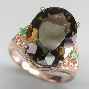 Элегантное кольцо с дымчатым топазом и изумрудами