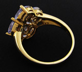 Изящное кольцо с танзанитами Золото