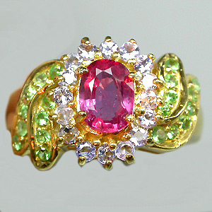 Кольцо из коллекции "Mia" с ярким сапфиром, танзанитами и цаворитами гранатами