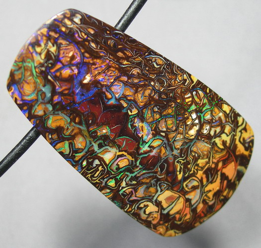 Австралийский болдер опал 96,63 карат на шнуре