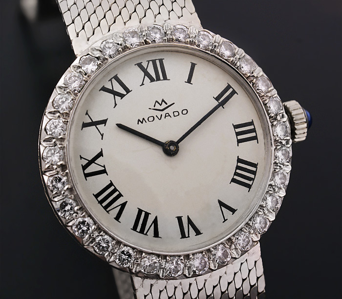Золотые часы от "MOVADO" с бриллиантами
