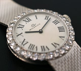 Золотые часы от "MOVADO" с бриллиантами Золото