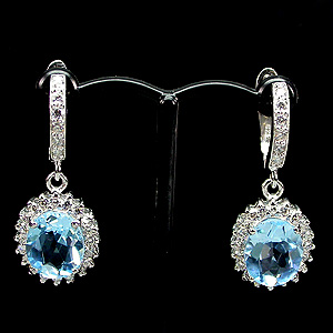 Серьги с голубыми топазами