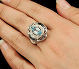 Эффектное кольцо с голубым топазом и эмалью Серебро 925